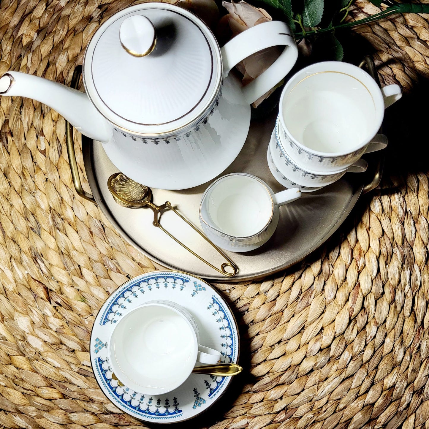 12-Piece Bone China Tea Set (set includes a teapot, creamer, and 5 cup and saucer sets)